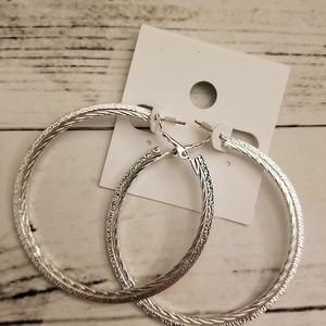 Silver textured large hoop earrings. Nwt